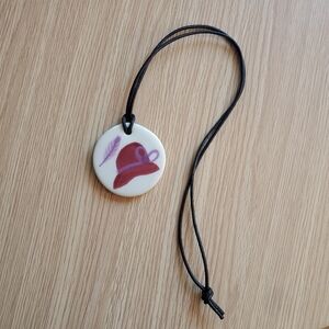 Ceramic pendant necklace‎ feather and hat